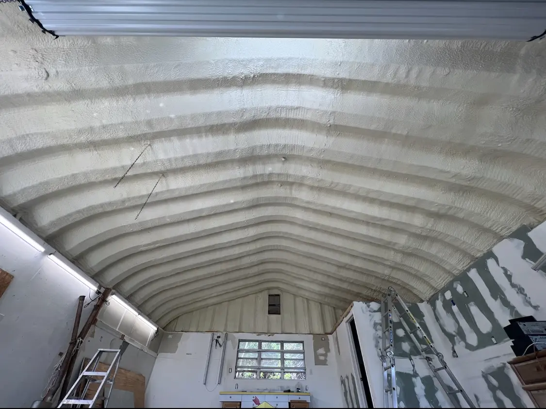 Spray polyurethane foam applied to the underside of a metal roof deck in Hattiesburg